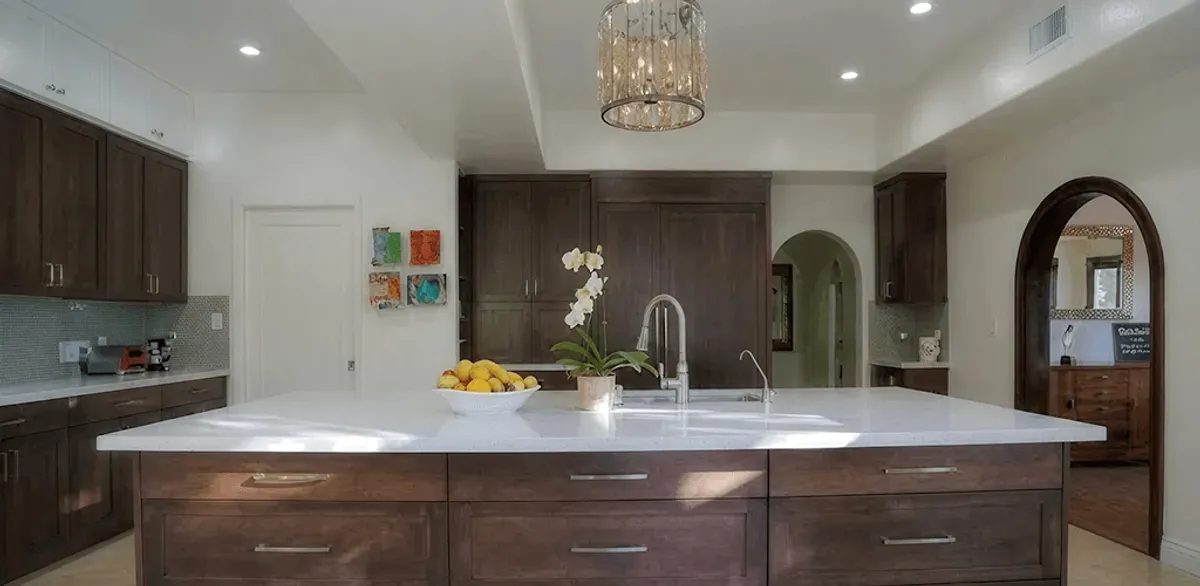 Cabinet refacing project with updated kitchen cabinets and island in Lowell, MA